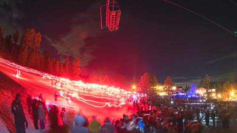 Snow Summit's New Year's Eve Concert and Torchlight Parade crowd shot with lights all around