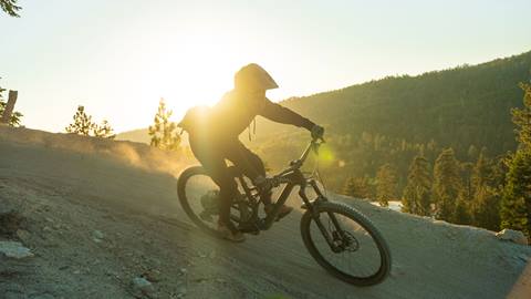 Mountain biker during a sunset Twilight session at Snow Valley bike park