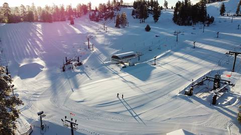 drone view of Snow Valley's base area in the winter